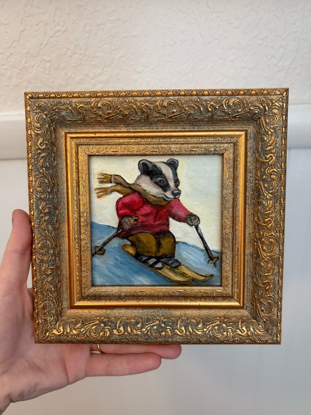 "Skiing Badgerā Original oil painting on wood board mini framed 4x4"